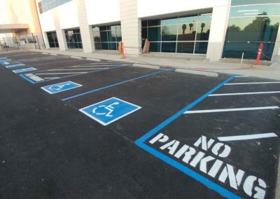 A parking lot with no parking signs painted on it.