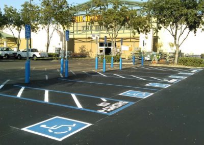 A parking lot with handicap parking spaces.