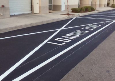 A parking lot with a white line painted on it.