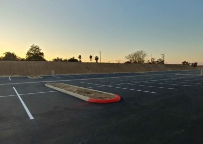 An empty parking lot at sunset.